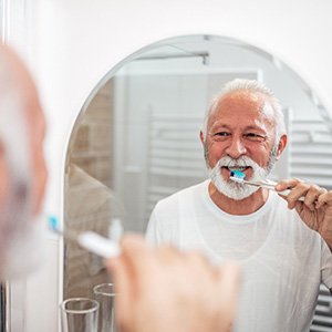 A man brushing his teeth
