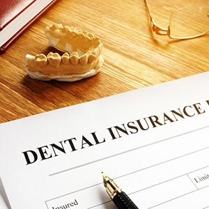 Patient in Rowlett checking dental insurance for braces coverage
