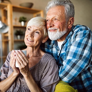 an older couple enjoying each other’s company at home